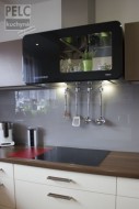 Zajímavý designový odsavač dává důraz varnému centru.